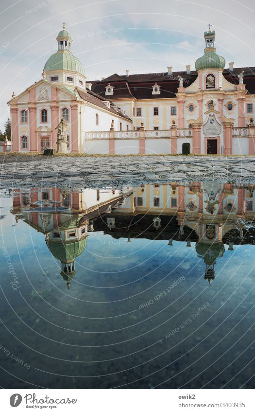 Abbey Building Old Historic Monastery abbey main building Facade Baroque Ornate Portal Entrance Roof Window distinguished Rich Sky cloudy Puddle reflection