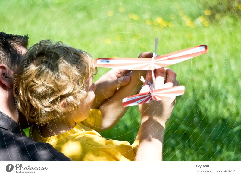 jump-start Man Child Father Boy (child) Snapshot Hair and hairstyles Blonde Curl Dream Sun Playing Airplane Sailplane Sunlight Contentment Family & Relations