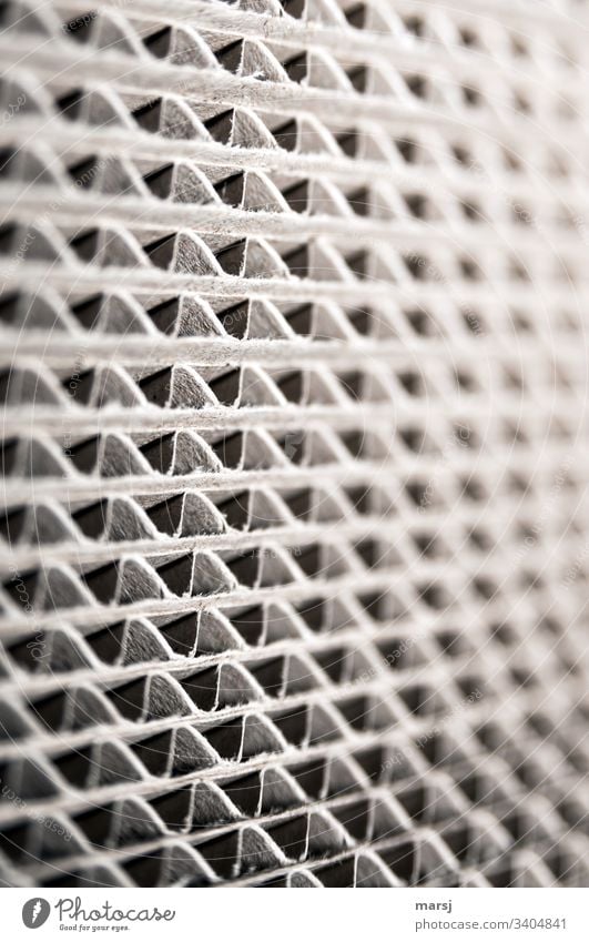 Corrugated cardboard stacked on top of each other Corrugated board Undulating Abstract fibrous Packaging material Light and shadow tight focus