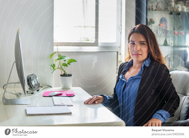 Free: Woman Sitting Near Desk 