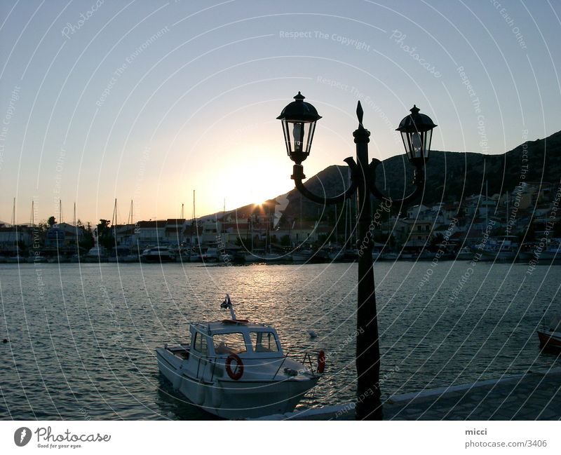 Sunset at the harbour Greece Samos Ocean Dusk Romance Lantern Watercraft Calm Europe Harbour Evening