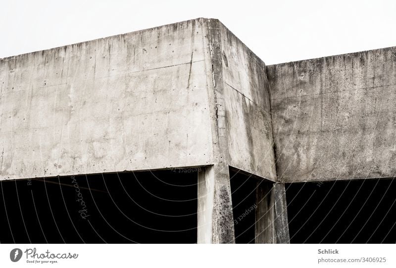 Simple concrete structure with corners on two thin supports Manmade structures Concrete Abstract Corners props high contrast areas Concrete walls angles