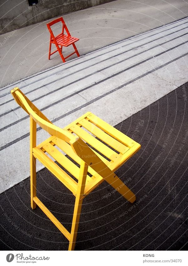 Dumped? Chair Yellow Loneliness Asphalt Multicoloured Flashy Things Orange Colour Stairs