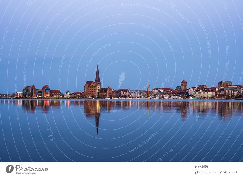 View over the Warnow river to the city of Rostock in the evening Town River Mecklenburg-Western Pomerania Warnov city harbour Architecture houses Building