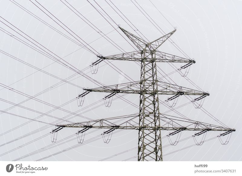 Power pole with many cables Electricity High voltage power line Electricity pylon Transmission lines Energy industry Overhead line Power transmission Insulation