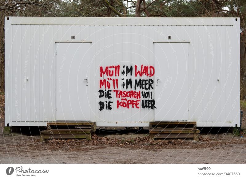 Capitalism - social criticism of public toilets in the forest Climate change critique of capitalism Characters Trash Forest Ocean ponder Environment Dirty Sand