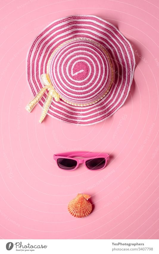 Girly beach accessories on pink background. Minimalist above view banner composition concept eyewear fashion flat lay frame girly hat heat holiday hot isolated