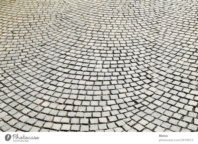 Abstract background of old cobblestone pavement close-up abstract abstracts architecture block brick bricks conceptual construction contrast detail flat floor