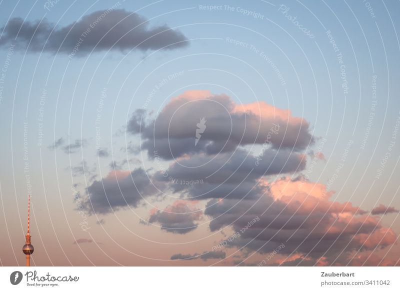 The sky over Berlin in the evening light with beautiful clouds and television towers Sky Clouds Twilight Evening Television tower Capital city Colour photo