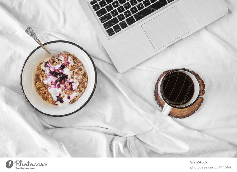 Breakfast in bed top view breakfast coffee cup white tray hot food background drink sugar sweet warm tea cream mood home closeup cozy muesli oats yoghurt