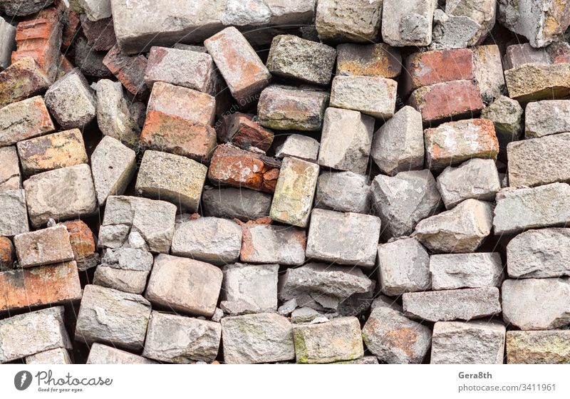 chaotic heap of old stone brick close up abstract backdrop background blank block brick pattern broken building chaos clutter coarse confusion crude detailed