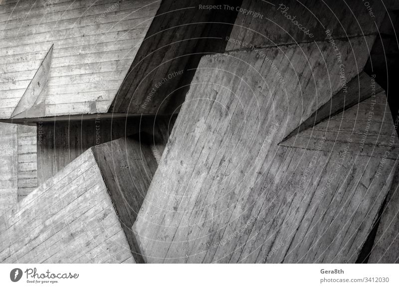 fragment of a gray concrete wall abstraction angle architecture background black blank blocks building curve dark design gloomy house light line modern pattern