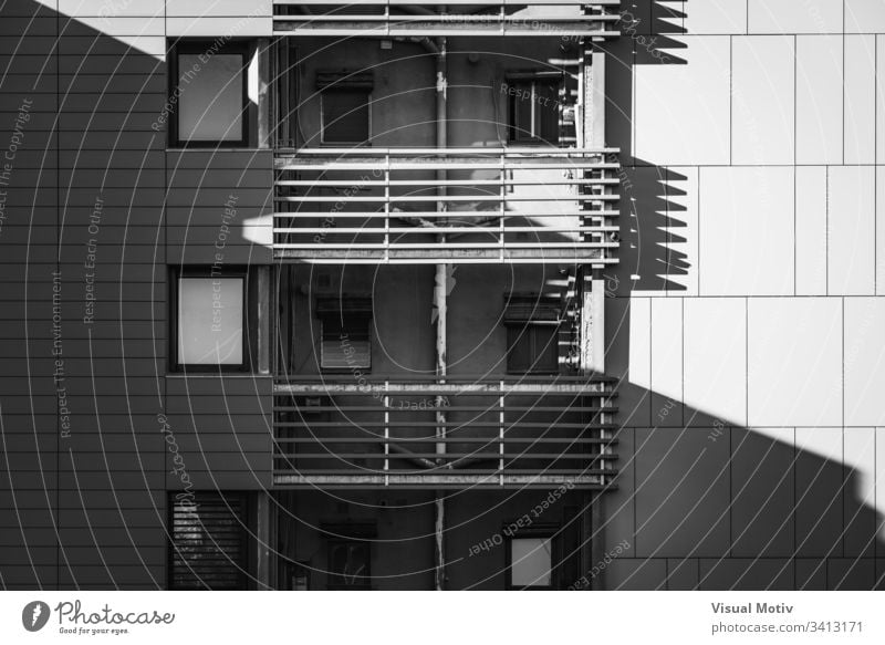 Balconies of a residential building in black and white facade windows balconies architecture architectural architectonic urban concrete structure shapes
