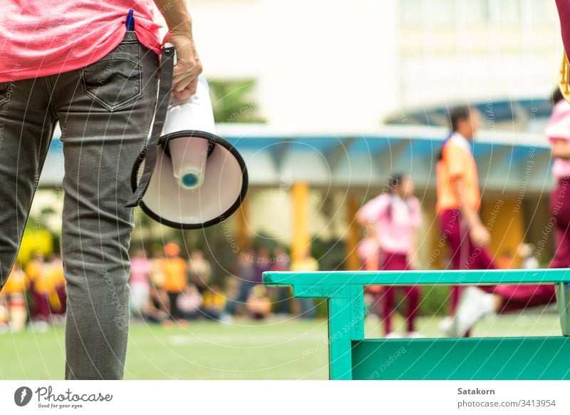 BANGKOK, THAILAND - January 15,2019  At the school's annual sporting event, Elementary student girls with their coach in the chair ball sports match young