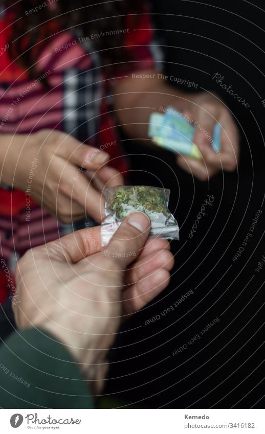 First person view of people buying and paying marijuana or drugs isolated on black background. Drug trafficking: sell and buy marijuana. cannabis dealer trader