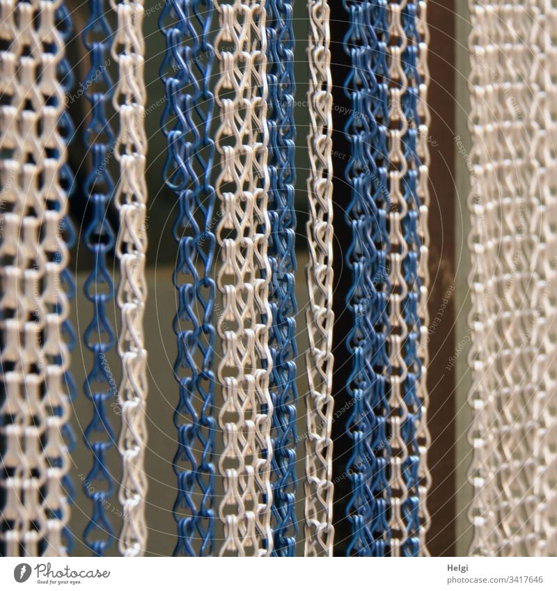 hanging white, grey and blue chains as a curtain on a door Chain Chain link chain curtain Drape Screening Hang Blue White Gray Metal Exterior shot Deserted