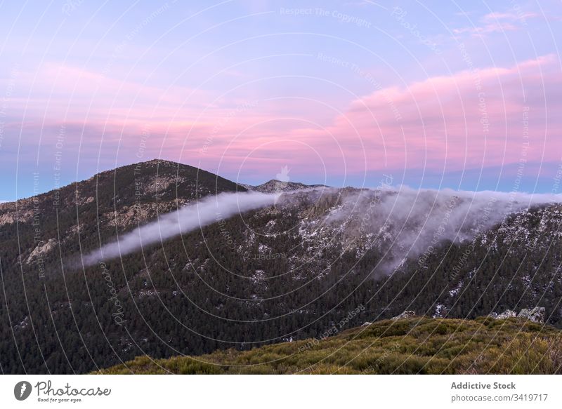 Mountains during sunset mountain sky cliff nature adventure tourism evening freedom formation tranquil hill peak beautiful travel environment top idyllic valley