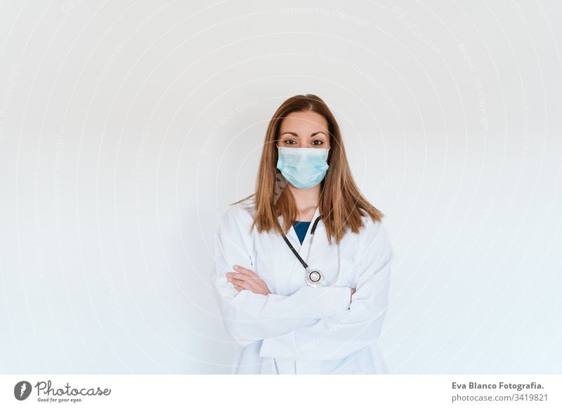 portrait of doctor woman wearing protective mask and gloves indoors. Corona virus concept professional corona virus hospital working infection safety epidemic