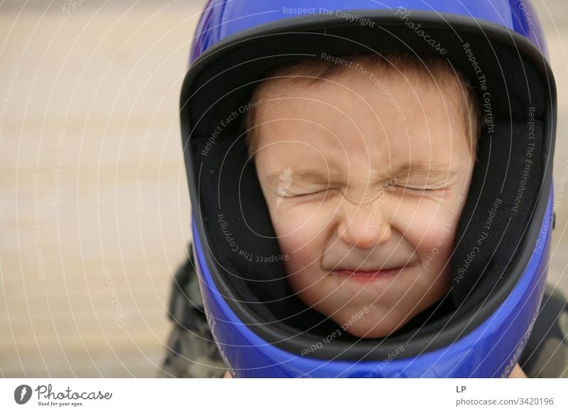 Boy wearing a helmet Helmet Protection Family & Relations parenthood space Space cadet Infancy Parents Adults Parenting Parental care Passion Closed eyes Dream