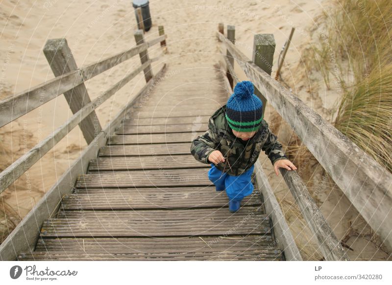 boy climbing stairs Boy (child) Stairs stairs up future picture Optimism Power Determination Success Future Career Brave Willpower Resolve Emotions