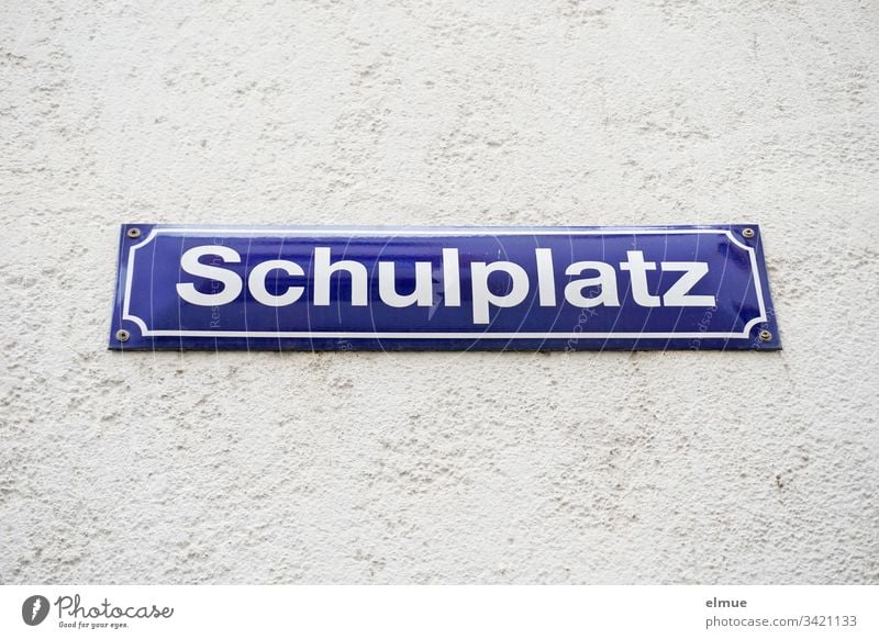 Sign "Schulplatz" sign street sign School place Wall (building) Communication Name writing designation Reading Places Wall (barrier) Enamel sign Exterior shot