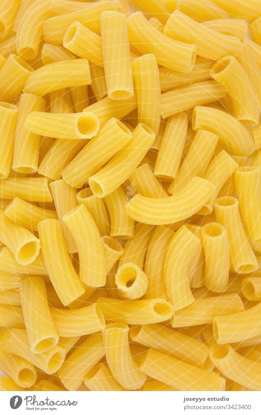 Macaroni texture for the background. Flat layout. Carbohydrate Carbohydrates Close-up Cooking Kitchen Delicious Detail Diet Dinner Dry flat laying Food Fusilli