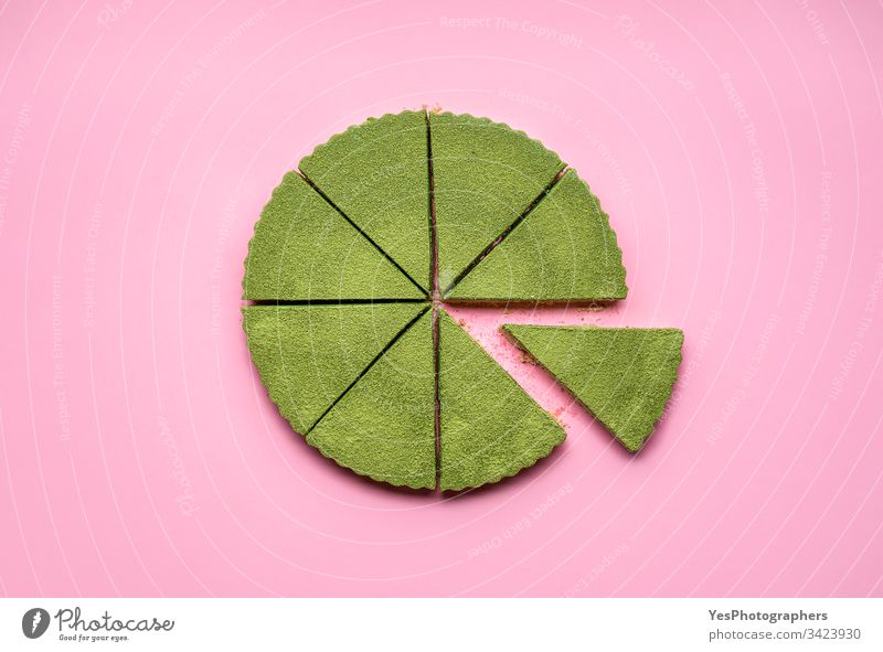 Sliced cheesecake made with matcha.  Healthy green dessert above view cheesecake tart colorful confectionery creamy delicious flat lay food green cheesecake