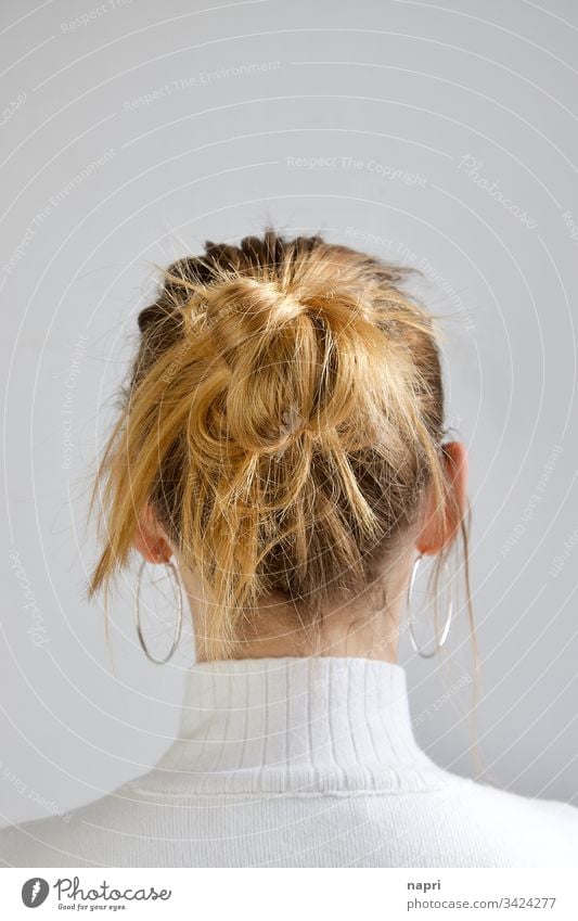 Untidy hairstyle of a blonde young woman from behind. Young woman Blonde Chignon Hair and hairstyles long hairs Disheveled Youth (Young adults) Anonymous Nape