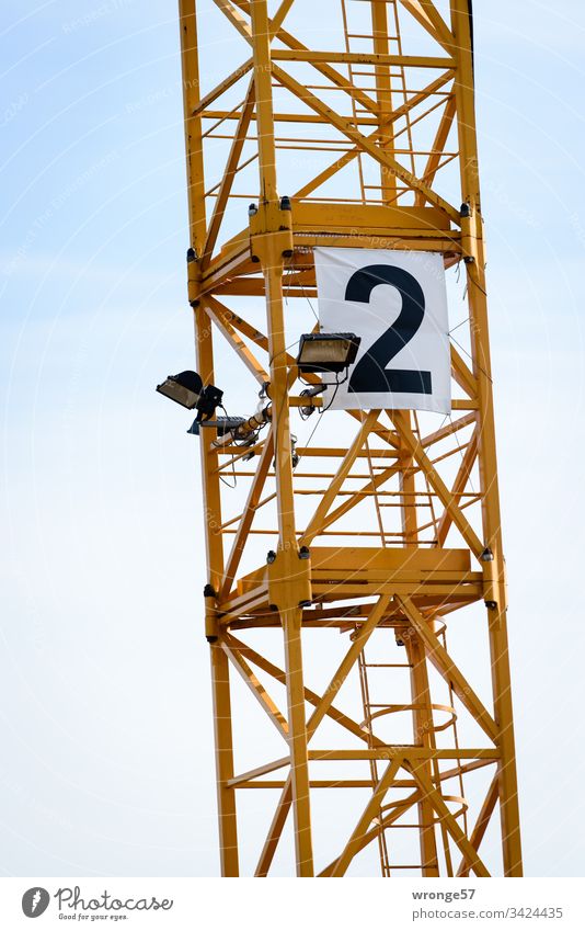 Detail construction site crane number 2 Construction site crane Crane detail Exterior shot Sky Colour photo Deserted Digits and numbers Signs and labeling