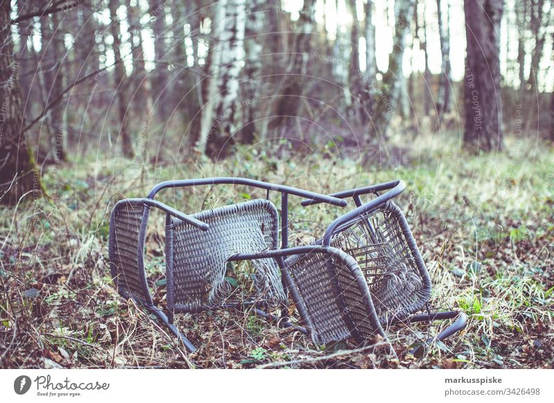 Illegal waste disposal in the forest illicit Waste management Forest punishable Penalty Chair chairs Broken Disposal Environmental pollution Perpetrator