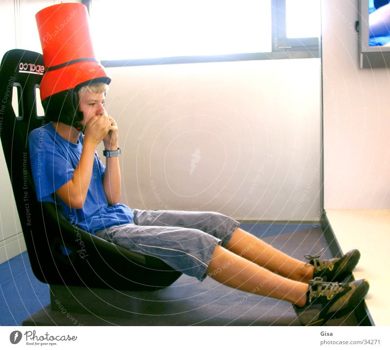 racing driver Playing Boy (child) Child Helmet Tub Bucket Armchair Man Seating Joy