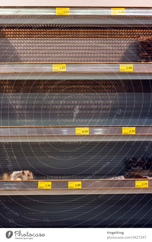 Empty bread shelves in the supermarket Price tag Shelves Supermarket Shopping hamster purchases corona covid19 coronavirus sold out Panic pandemic staple food