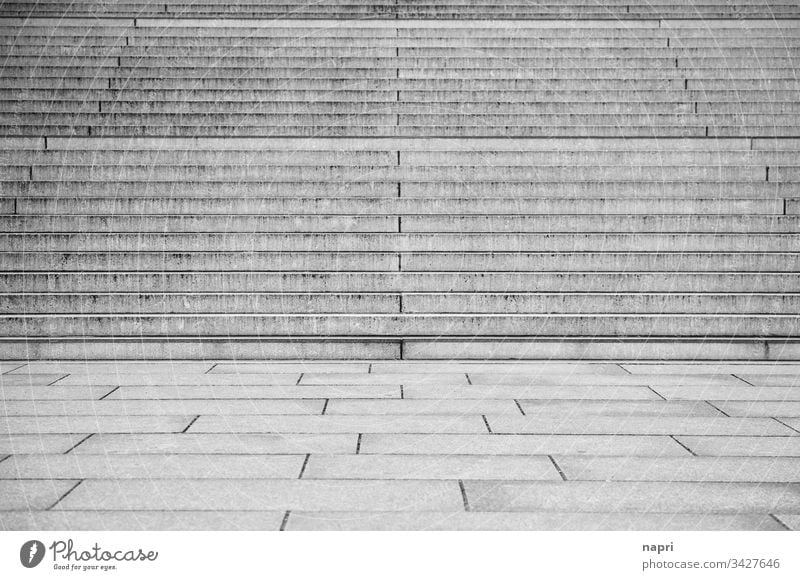 stepped | staircase of wide stone steps, empty space in front. stagger Steps upstairs Symmetry Architecture Deserted Structures and shapes Town Gray lines Wide