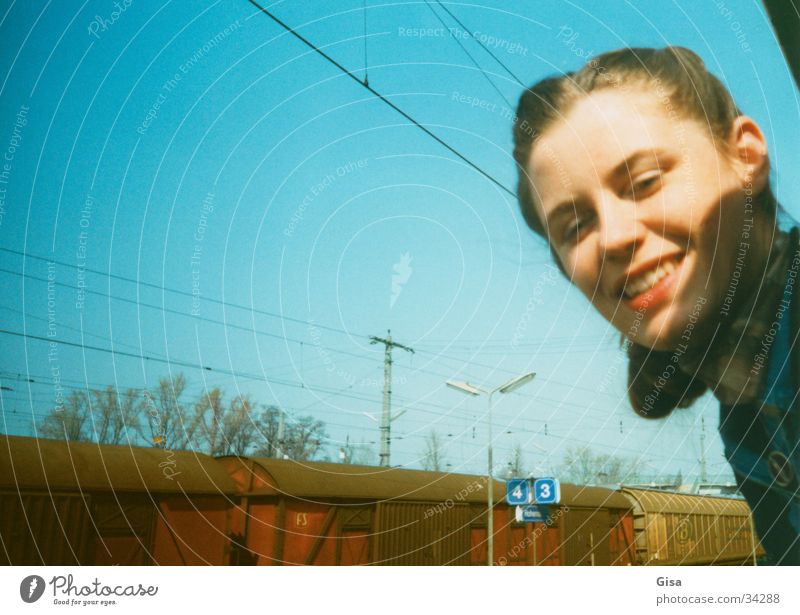 We're going to Prague Portrait photograph Woman East Railroad Window Station Vacation & Travel Come Europe Face Hohenau Sky Train station Joy Laughter Target