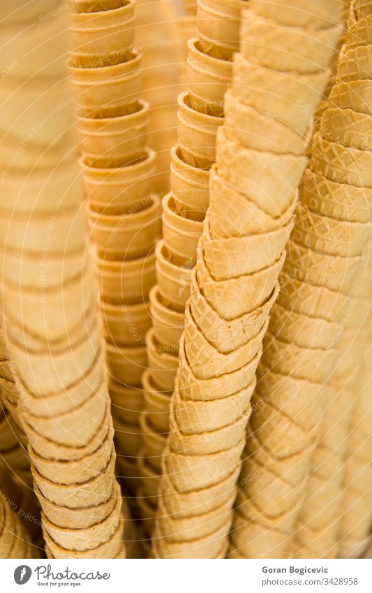 Stack of empty waffle ice cream cones icecream dessert food wafer close background closeup shop sweet delicious crispy group detail tasty sweets stacked many