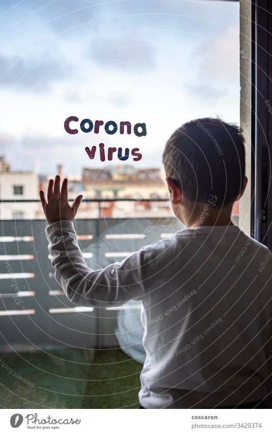 Little boy in confinement for the Coronavirus pandemic 2019-ncov care child corona virus coronavirus covid covid 19 covid-19 disease epidemic equipment face flu