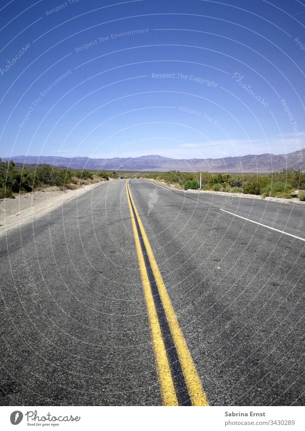 Empty highway with blue sky in America empty freeway Highway Motorway panorama Street empty street American highway Highway in the desert Transport travel