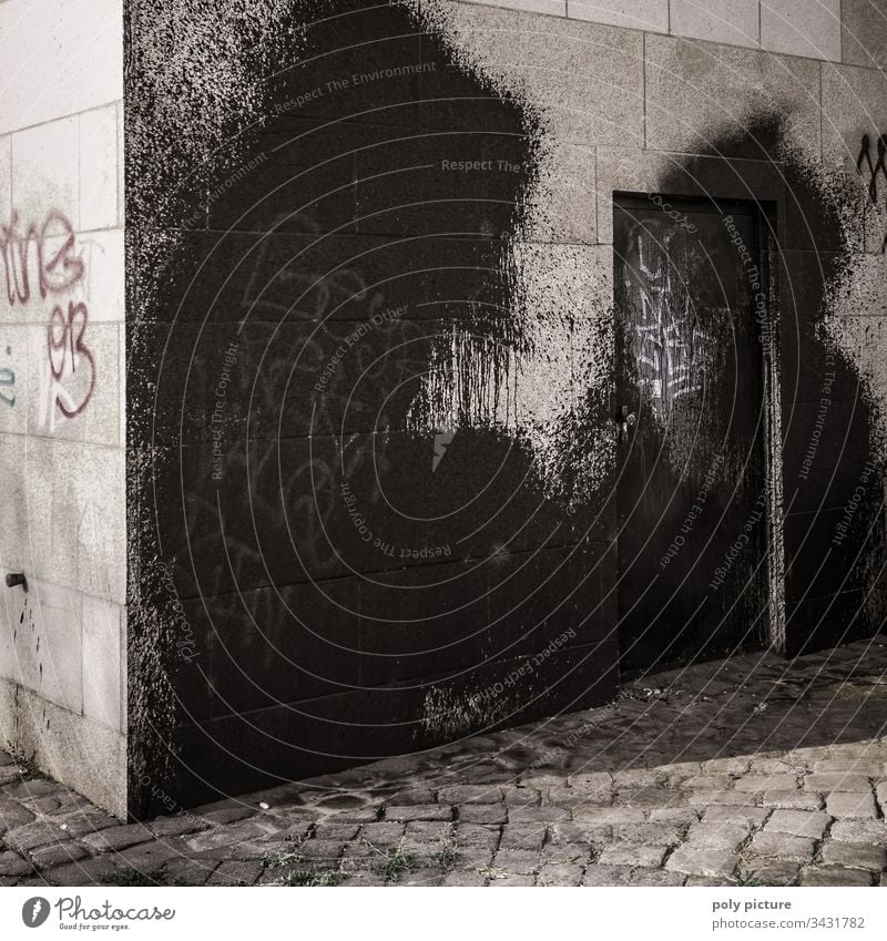 Huge black graffiti on a bridge pier in Dresden Graffiti Bridge Vandalism Exterior shot Deserted Town Facade Black Street art Daub Art Wall (barrier) Subculture