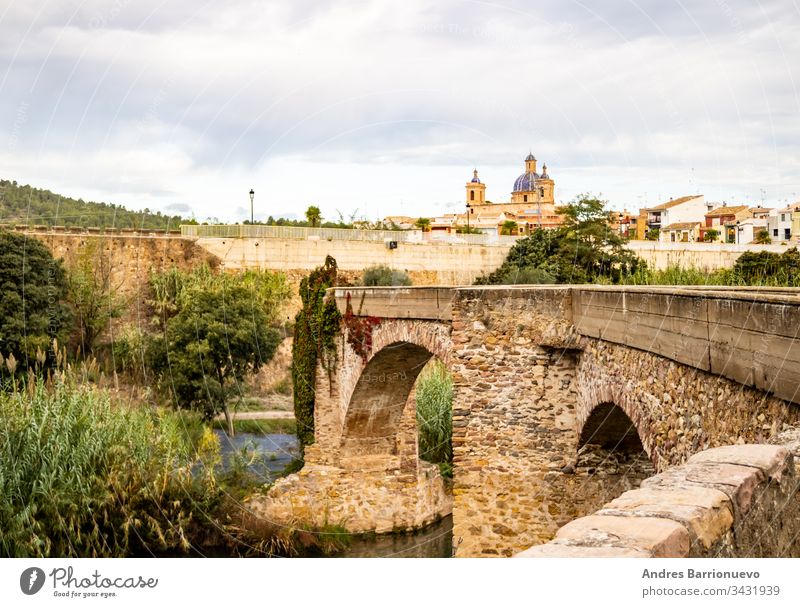 Old stone bridge rock landscape view travel scenic blue sky outdoors arch architecture summer water old stream place topography mountain leaf wet natural stones