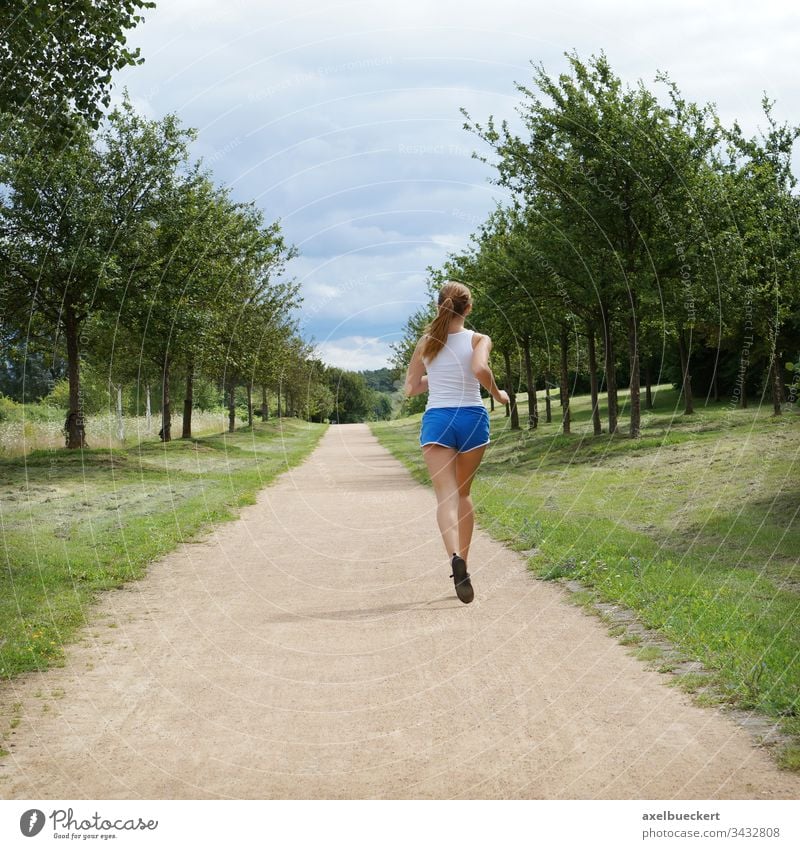 Exercise Women, Free Stock Photo, A young woman jogging outdoors