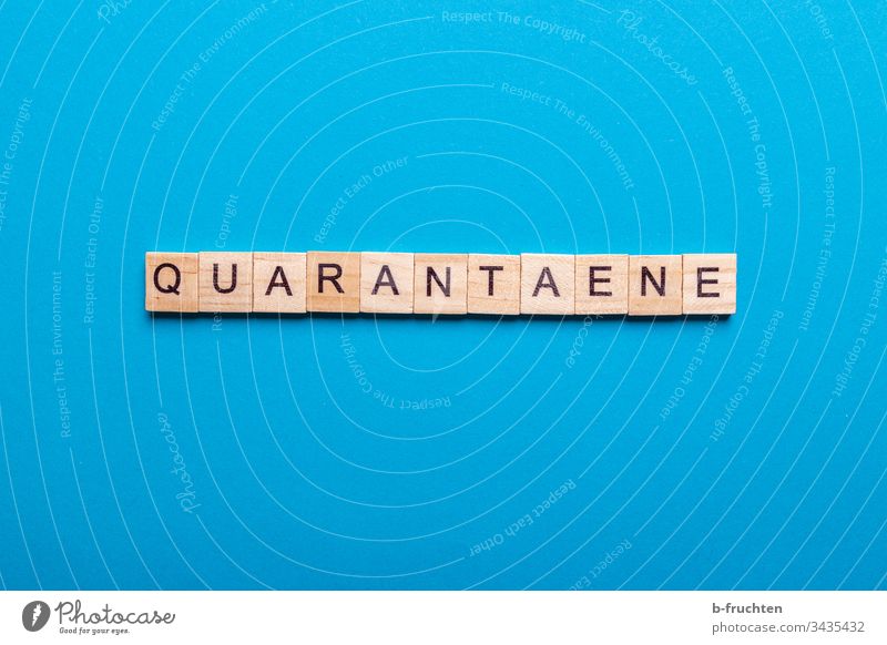 Scrabble letters with the word "Quarantaene Quarantine Quarantine period coronavirus covid-19 Virus Spread Illness COVID Epidemic Protection Risk of infection
