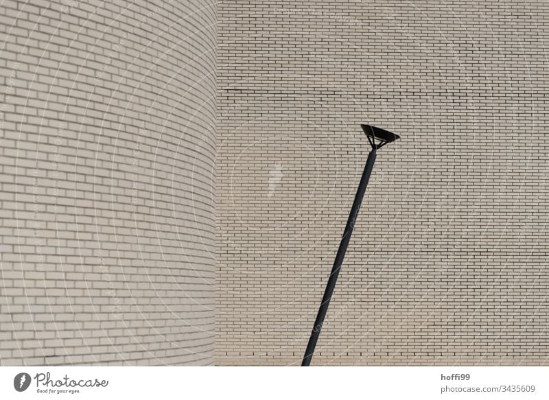 Street lamp with brick wall Wall (building) Architecture minimalism Tilt Destruction Decline Lamp post Lantern Facade Wall (barrier) Building Esthetic Line