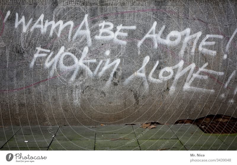 Leave me alone! Graffiti Wall (barrier) Wall (building) Characters Facade Town Concrete wall Sidewalk off Sign leave sb. alone fuck fuck you fuck off