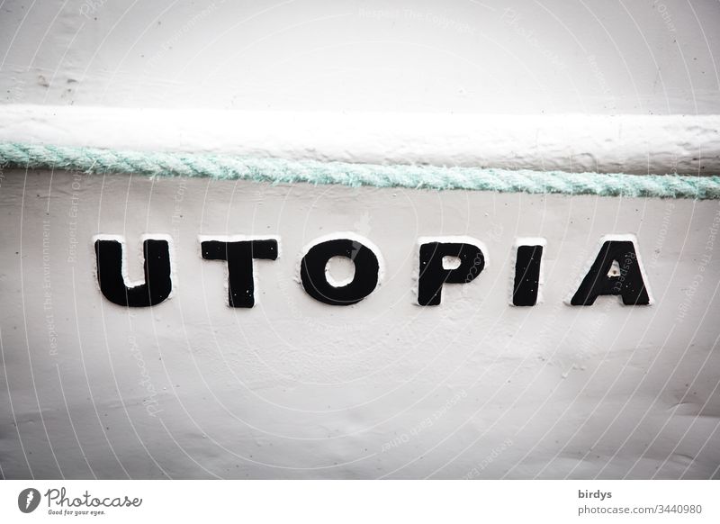 Utopia, writing on a boat, refers to a country where everyone is equally well off, an ideal state of affairs for everyone. Characters and letters Term