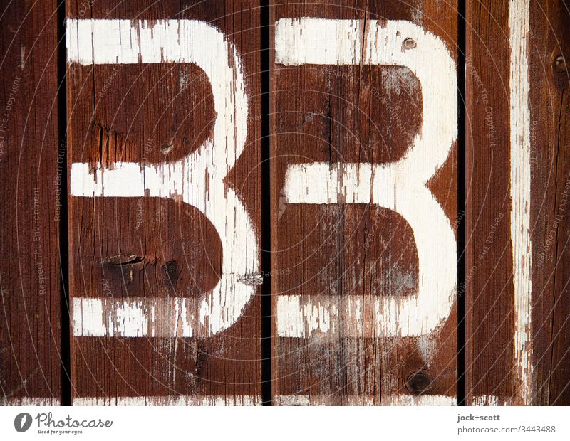 33 no more, no less Surface Ravages of time Signs and labeling Design Value Digits and numbers Typography Retro Simple Authentic Transience Change Weathered