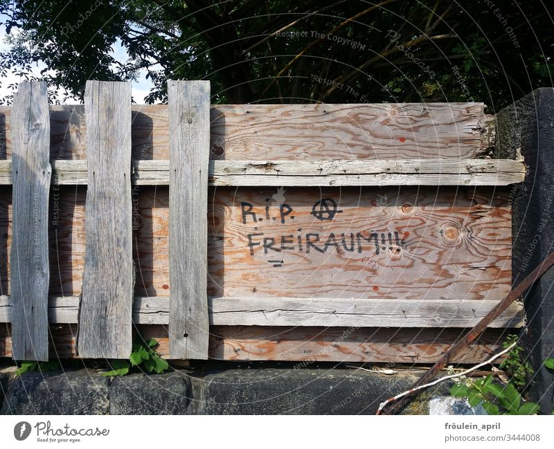 RIP Freiraum - lettering on a wooden fence containment cordon Closed board Fence Wooden fence Barrier Protection Bans Safety Characters Freedom Rebellious