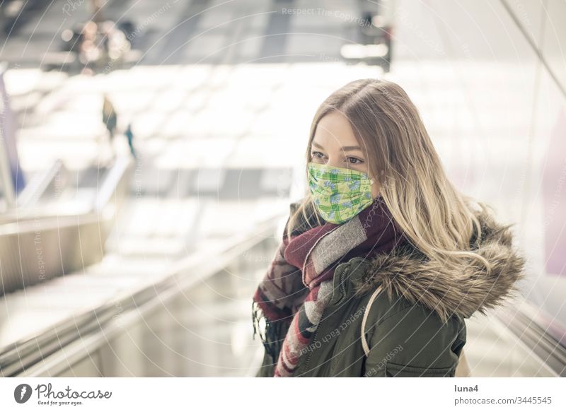 young woman with mouth guard in the city Woman Mask Respirator mask Face mask Town Young woman Virus coronavirus anxious viruses pandemic Infection Threat flu