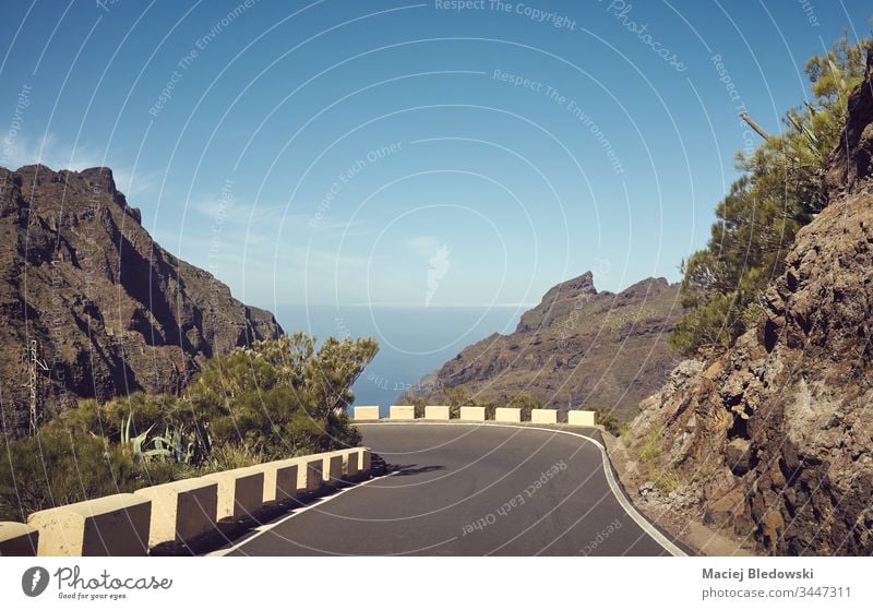 Scenic mountain road, Tenerife, Spain. trip journey landscape drive retro filtered vacation nature day travel summer no people sky rock cliff adventure