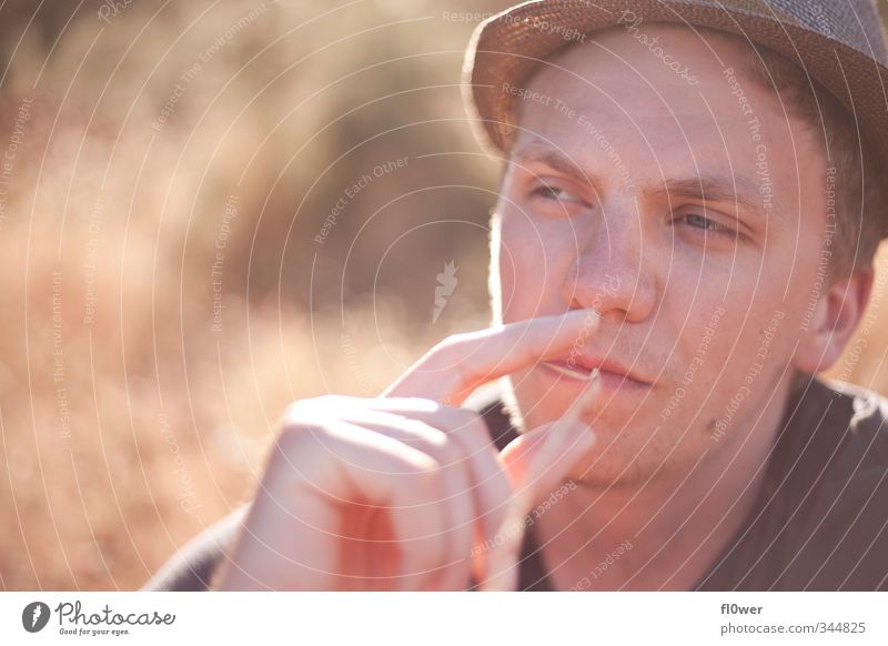 smoking awesome Masculine Young man Youth (Young adults) Man Adults Head 1 Human being 18 - 30 years Grass Bushes Fashion Hat Blonde Facial hair