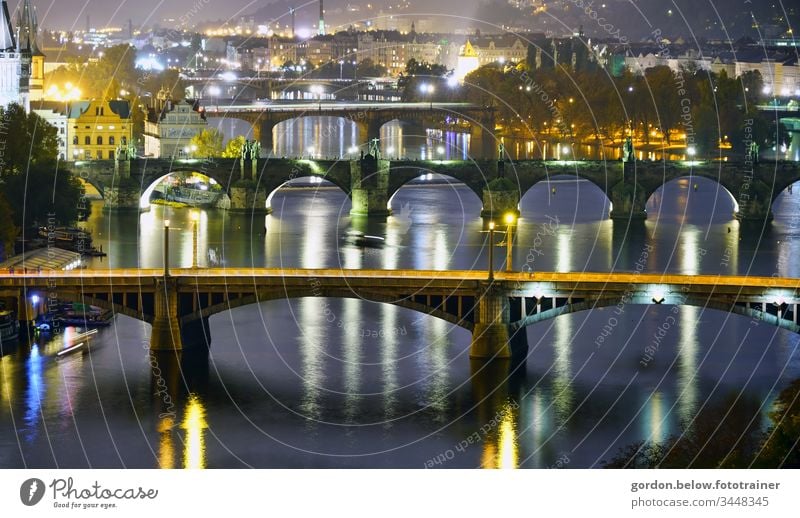 the bridges of Prague Night shot Panorama photo Colour photo little colour blue grey white black gold green Deserted Bridge in the foreground